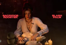 A woman holds a rooster during a candlelit ritual in Until Dawn 2.