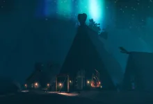 A dark Valheim settlement with wooden buildings and torchlight beneath a blue aurora