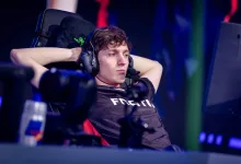 Boaster wearing a Fnatic jersey while seated at a gaming station during a VALORANT competition