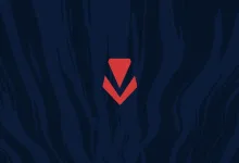 The red VALORANT emblem centered on a dark blue background