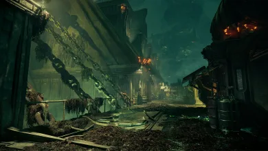 An industrial passage with hanging chains, corroded surfaces, and orange lights in Warhammer 40,000: Darktide.