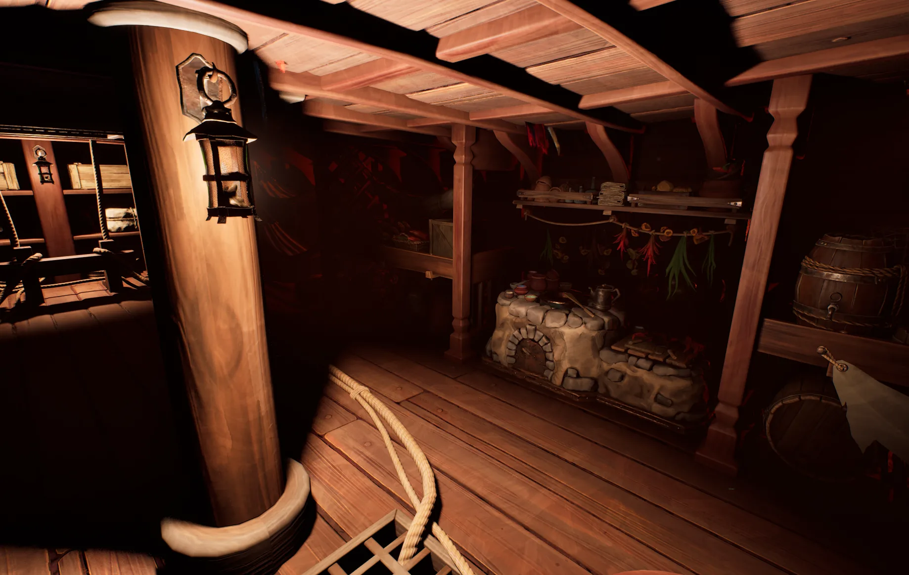 A cooking hearth and cookware installed below deck