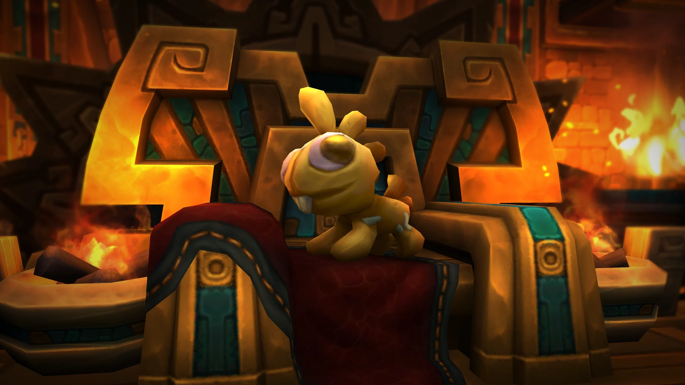 A gold-colored Grrgle housing decor item displayed in a furnished room.