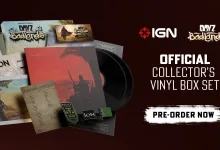 The DayZ Badlands collector’s vinyl box set is displayed with soundtrack records, sleeves, a code card, printed inserts, and patches.
