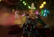A miner wearing a carved pumpkin mask stands in a Halloween-decorated Space Rig among hanging ghosts and pumpkins.