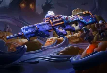 A blue-purple rifle decorated with Halloween motifs is displayed among pumpkins and spooky decorations.