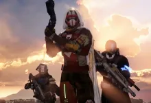Three armored Destiny Guardians stand beneath a golden sunset, with the central Guardian holding a weapon aloft.
