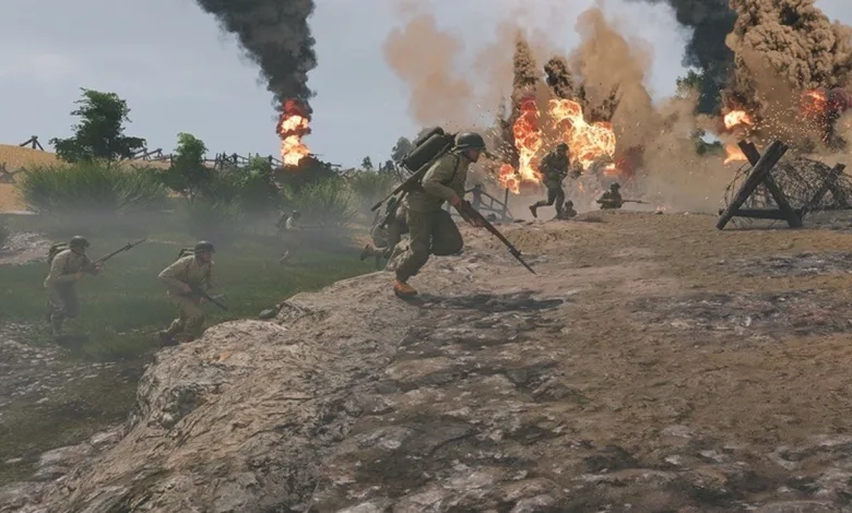 Enlisted soldiers advance across a smoke-filled battlefield amid explosions.