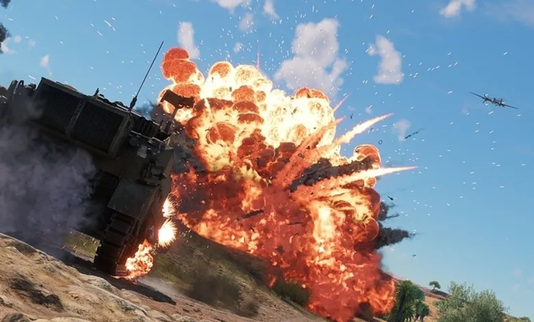 A large explosion beside an armored vehicle on an Enlisted battlefield.