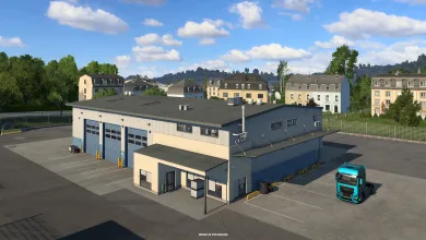 A wide truck garage with a turquoise truck parked outside in Euro Truck Simulator 2.