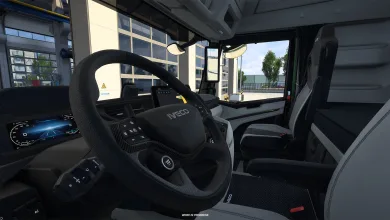 View of the Iveco S-Way steering wheel, dashboard and passenger seat in Euro Truck Simulator 2.