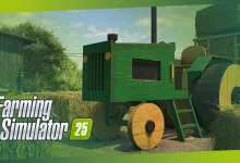A green baler sits among hay bales in a Farming Simulator 25 farmyard.