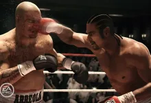 Two boxers exchange a punch in a boxing ring in a video game.
