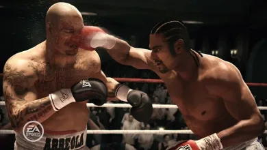 Two boxers exchange a punch in a boxing ring in a video game.