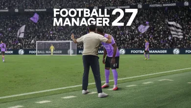 A manager embraces a player on the pitch in Football Manager 27.