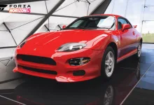 A red Mitsubishi FTO displayed in a Forza Horizon 5 showroom.