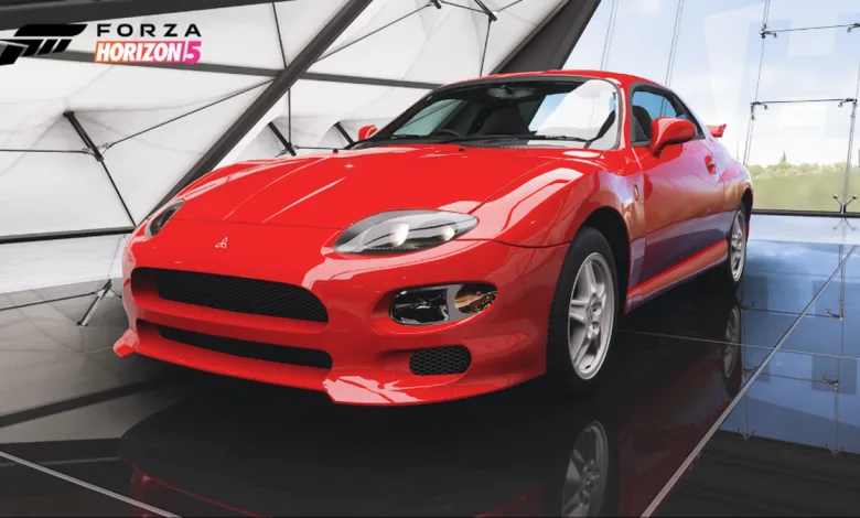 A red Mitsubishi FTO displayed in a Forza Horizon 5 showroom.