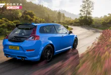 Rear view of a blue Volvo C30 Polestar driving along a countryside road in Forza Horizon 5
