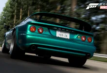 Green Lotus Esprit V8 driving along a wooded road in Forza Horizon 6