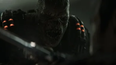 A snarling armored creature looms in the darkness in Gears of War: E-Day.