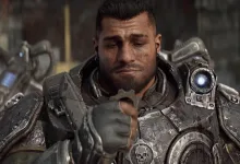 Close-up of an armored soldier with a glowing blue light on his shoulder.