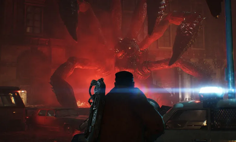 An armored soldier stands in a red-lit street facing a large creature amid damaged cars in Gears of War: E-Day.