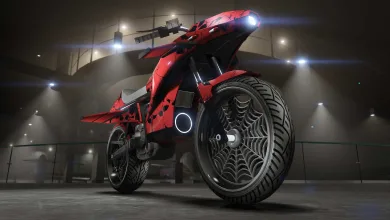 A red Pegassi Oppressor motorcycle with the Skulls livery displayed under indoor lights.