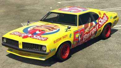 A yellow race car with Burger Shot branding and red wheels.