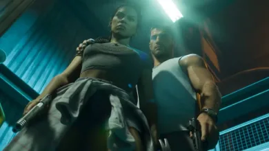 A woman and man stand together with firearms in a dim, blue-lit interior in Grand Theft Auto VI.