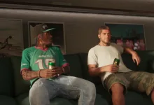 Two men sit on a couch holding drinks in a Grand Theft Auto VI scene.