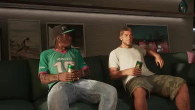 Two men sit on a couch holding drinks in a Grand Theft Auto VI scene.