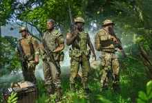 Four Gray Zone Warfare operators stand with rifles beside equipment in a dense jungle