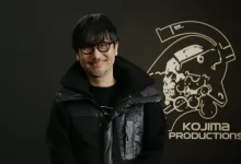 Hideo Kojima smiles beside a Kojima Productions logo.