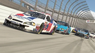 A pack of stock cars races around the Dover oval in iRacing.