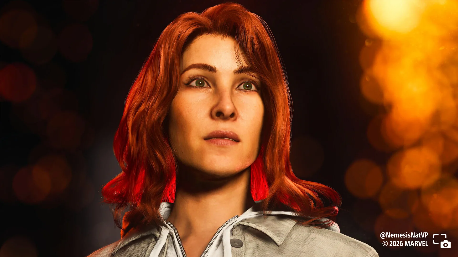 Jean Grey with long red hair in a softly lit portrait.