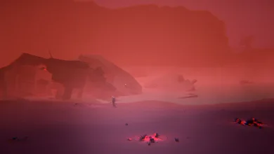 A suited explorer stands in a red, hazy landscape beside the wreckage of a crashed spacecraft.