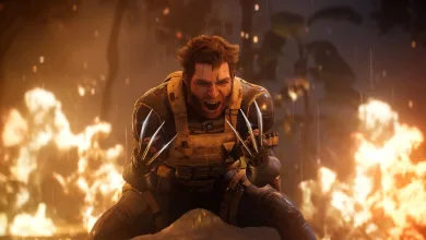 Wolverine crouches with his claws extended amid flames in Marvel's Wolverine.