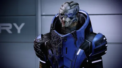 Garrus, a turian character wearing blue armor, shown in close-up.
