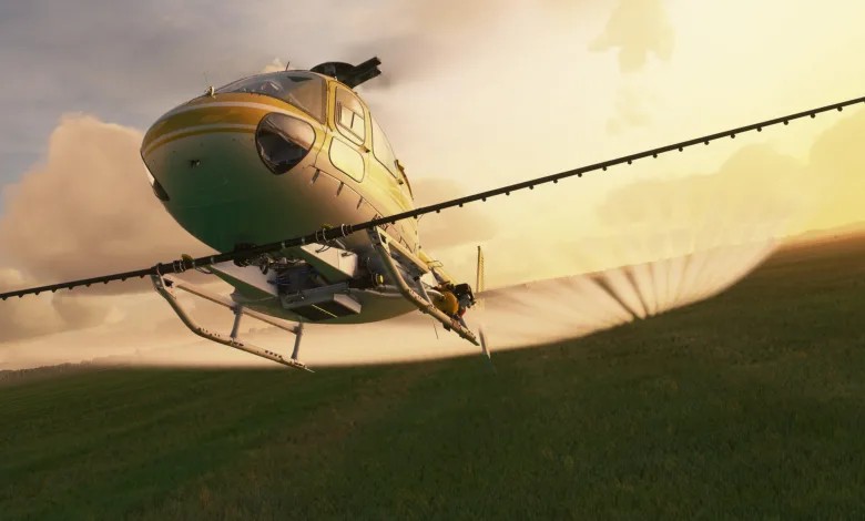 An Airbus H125 helicopter flying over fields at sunset in Microsoft Flight Simulator (2020).