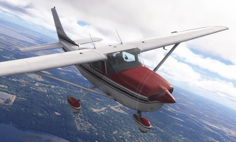 A white Carenado CT206 with a red nose and wheel fairings flies above a forested landscape.