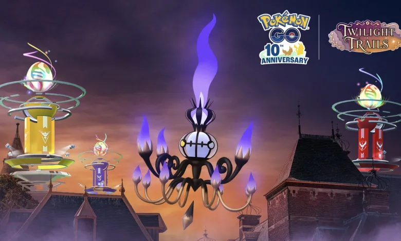 Chandelure floats above rooftops between Pokémon GO Gyms at dusk.