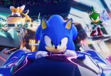 Sonic races in the foreground while Tails and another racer speed behind him in Sonic Racing: CrossWorlds.
