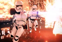 Two stormtroopers advance through a corridor amid bright sparks and explosions.