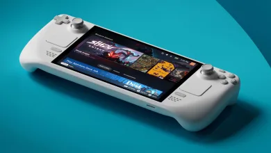 A white Steam Deck handheld gaming PC displaying its game library on screen.