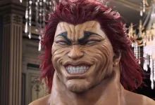 Close-up of red-haired Yujiro smiling in an ornate interior.