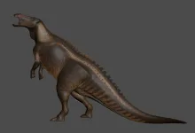 A brown dinosaur shown in profile against a gray background.