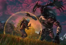 A white-haired witcher confronts a towering monster in a grassy ruin beneath a pink sky.
