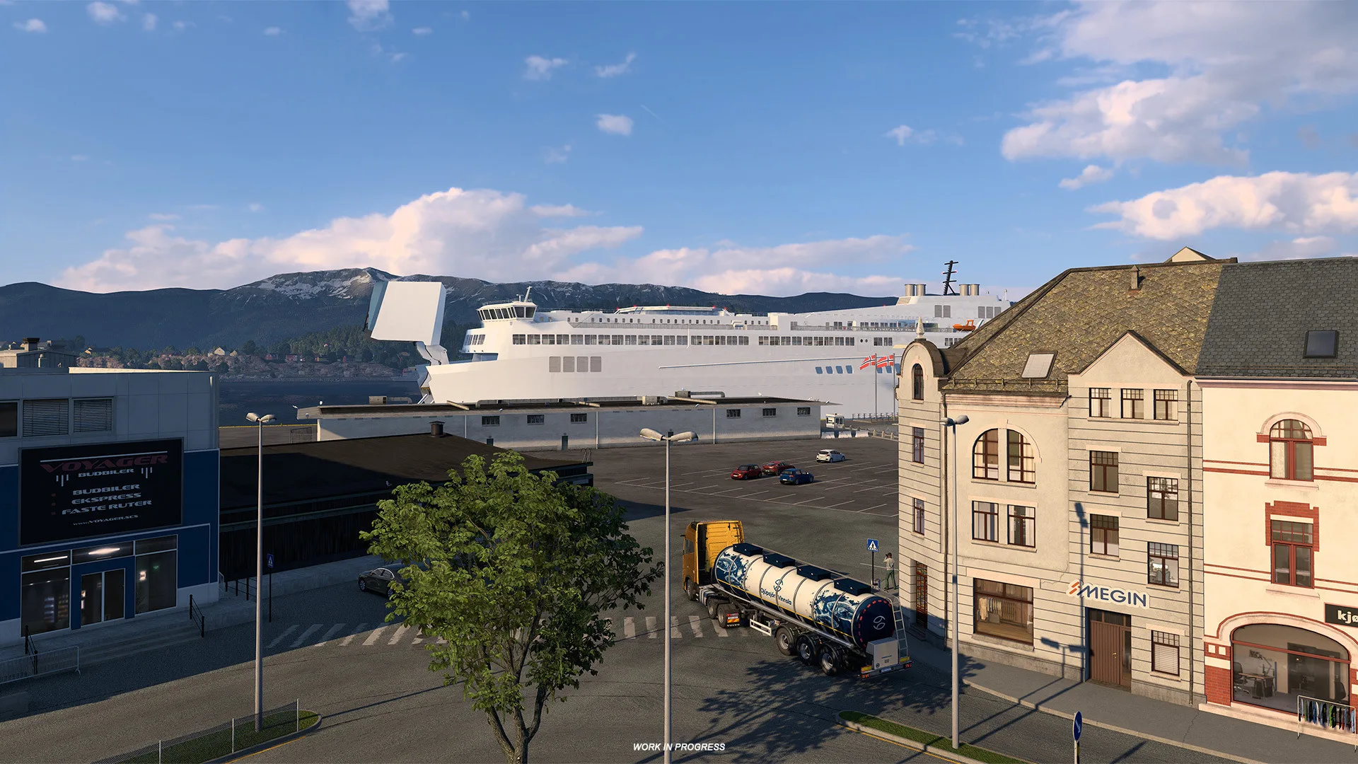 Truck and trailer beside a ferry at an industrial harbor