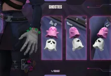 Close-up of Hush’s jade bracelet beside pink-and-white Ghostie charms in a cosplay reference.