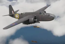 A British-marked Havoc Mk I flies through clouds with bombs falling beneath it.